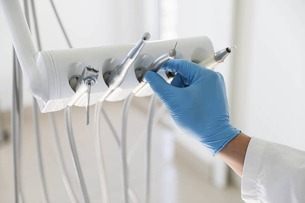 Professional Tooth Extraction technician working in Walters, OK